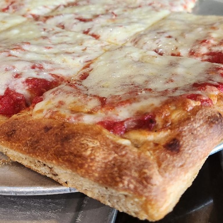 Delicious Sicilian Pizza Awaits